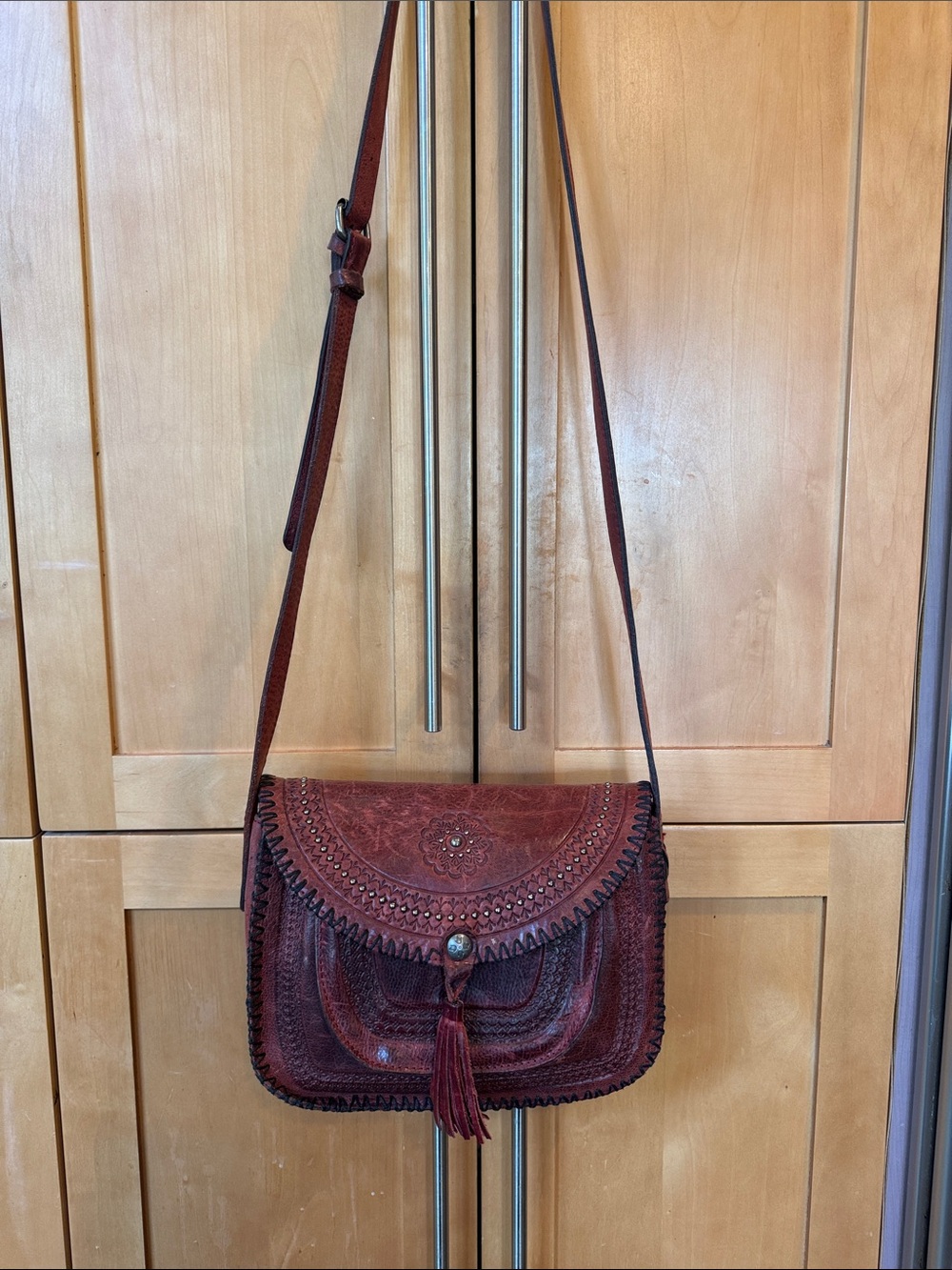 Patricia Nash Dark Burgundy Leather Embossed Crossbody with Tassel